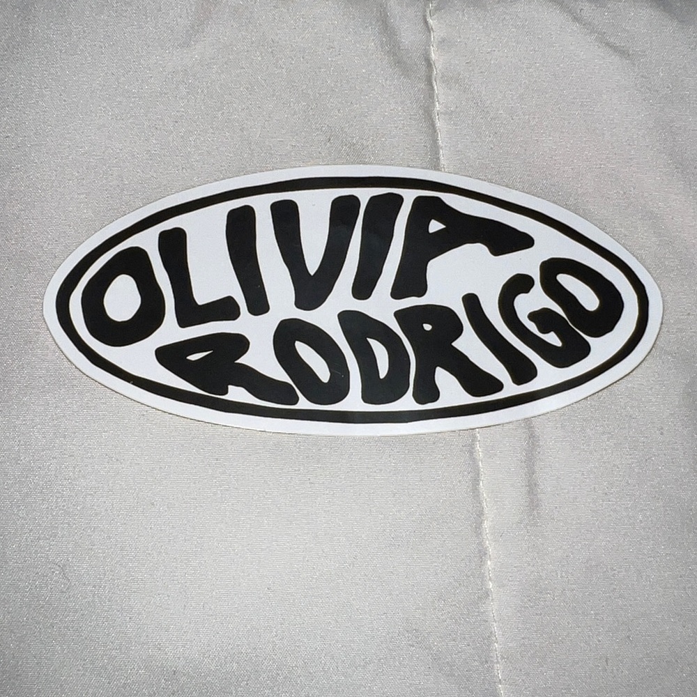 Olivia Rodrigo official merch sticker included in sour album